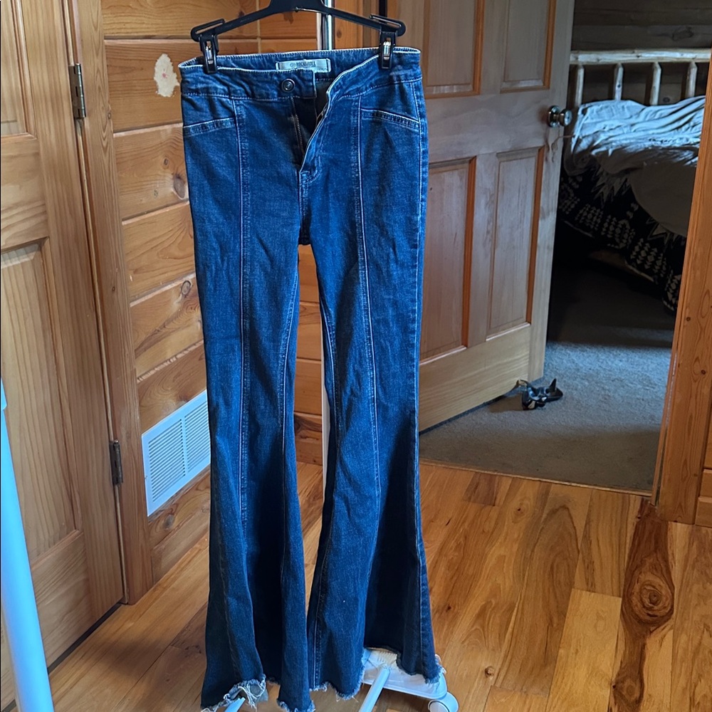 Flared Denim Jeans with Frayed Hem